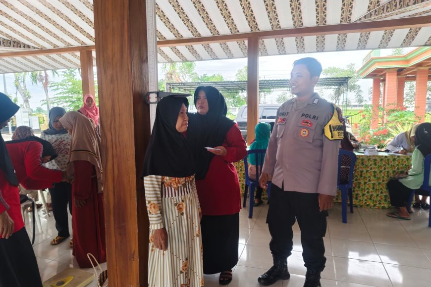 Sinergitas Polri dan Masyarakat, Bhabinkamtibmas Desa Kuwu Dampingi Kegiatan Posbindu